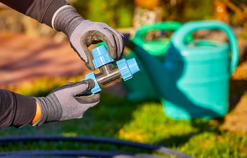 Residential irrigation system with pressure vacuum breaker backflow prevention device
