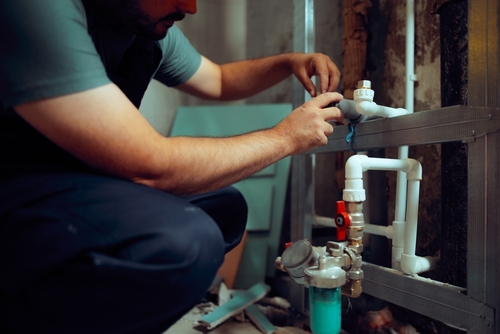 Professional backflow testing and repair process with certified equipment